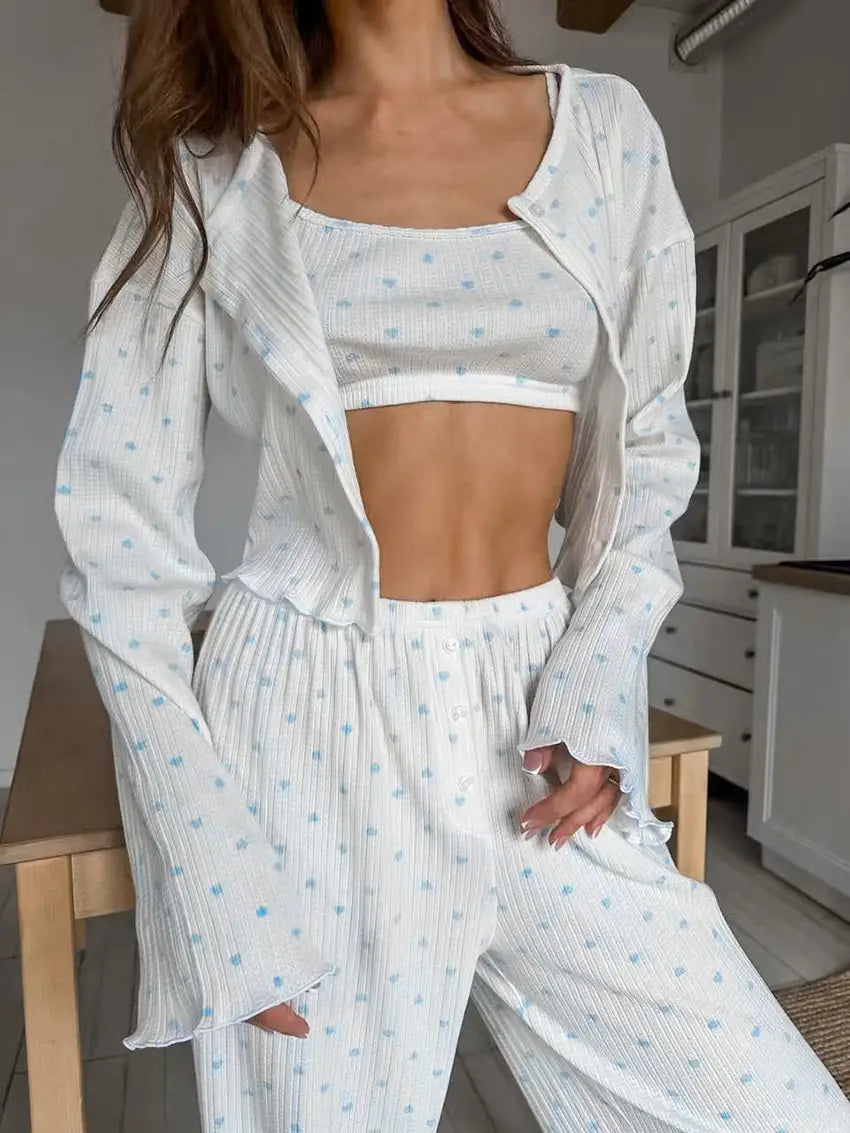 white knitted heart printing ribbed loungewear set featuring light blue heart patterns and ruffled details for comfortable wear.