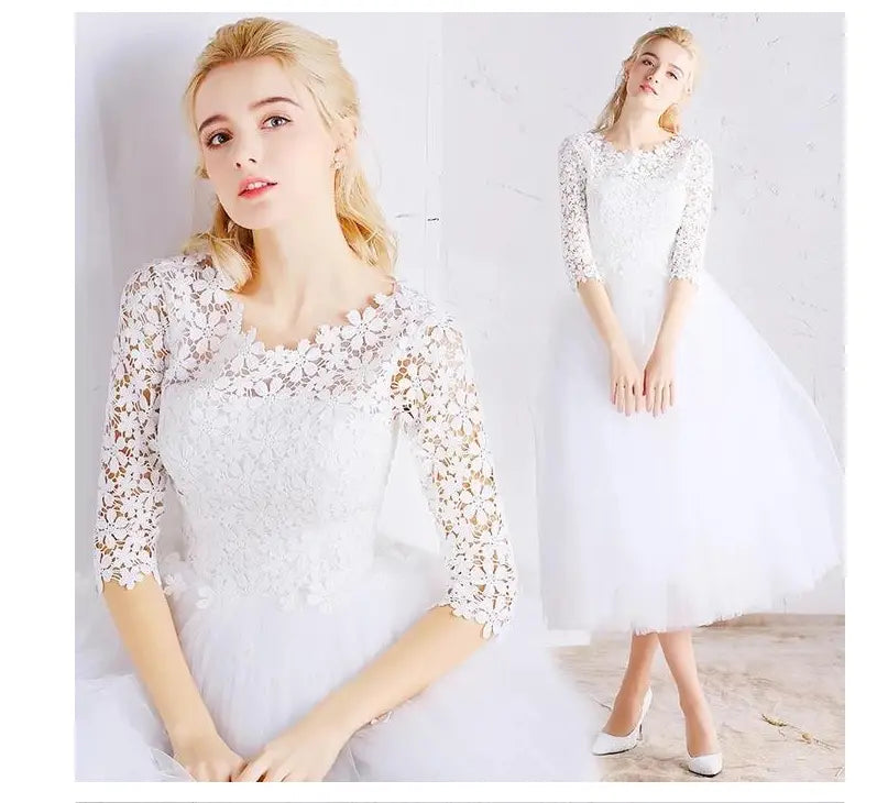 white lace floral wedding dress in white featuring tulle material and ladies small sleeves designed for party occasions
