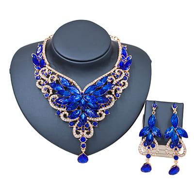 Blue butterfly-shaped necklace and matching earrings in gold-tone metal with sparkling rhinestones from the American Color Exaggerated bride jewelry set for color exaggerated bride speed selling explosion.