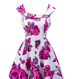 A white printed dress with vibrant pink roses and dark green leaves featuring a flared skirt and delicate ruffled shoulder straps, ideal for luxury women’s fashion and plus size dresses.
