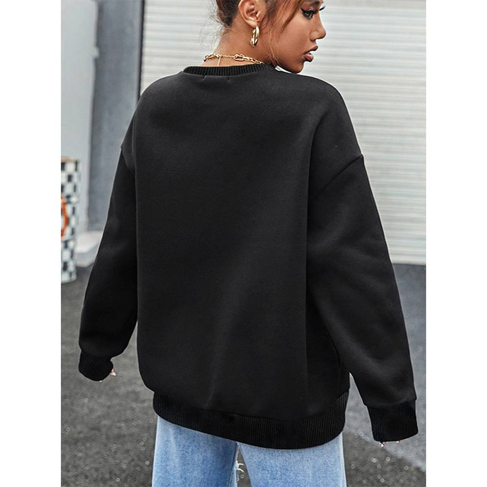 black oversized crew neck sweatshirt with ribbed cuffs and hem featured in the white number 15 graphic crew neck sweatshirt product line