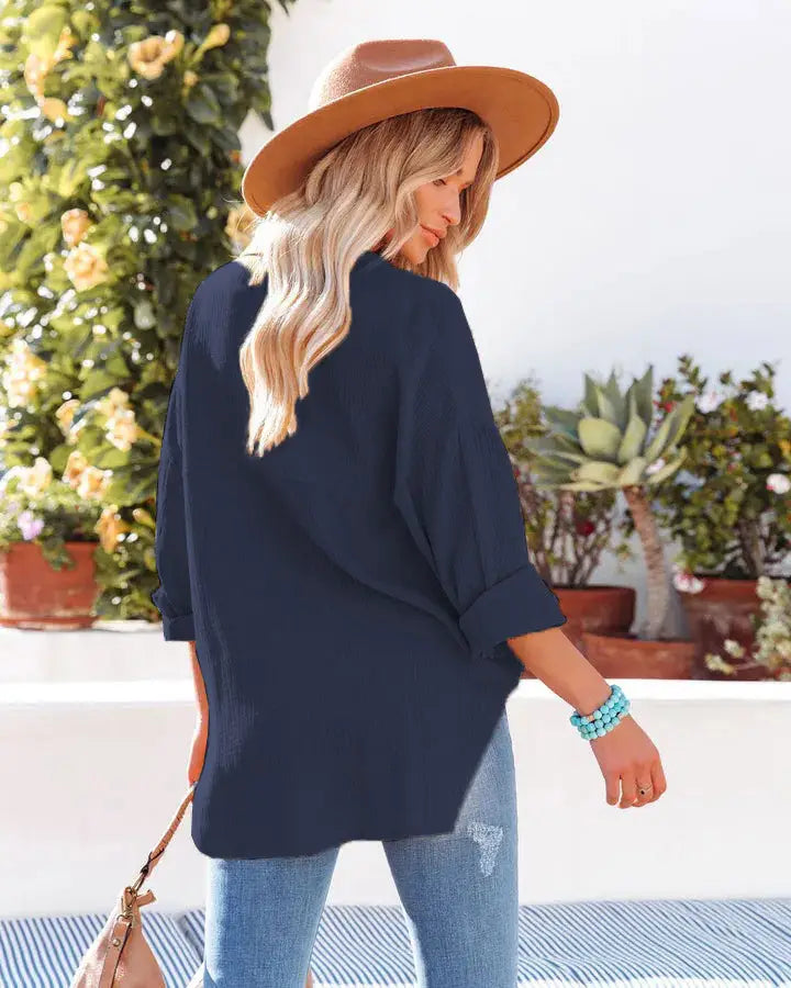 Navy blue oversized dropped shoulder bat shirt with rolled sleeves and relaxed fit perfect for casual wear.
