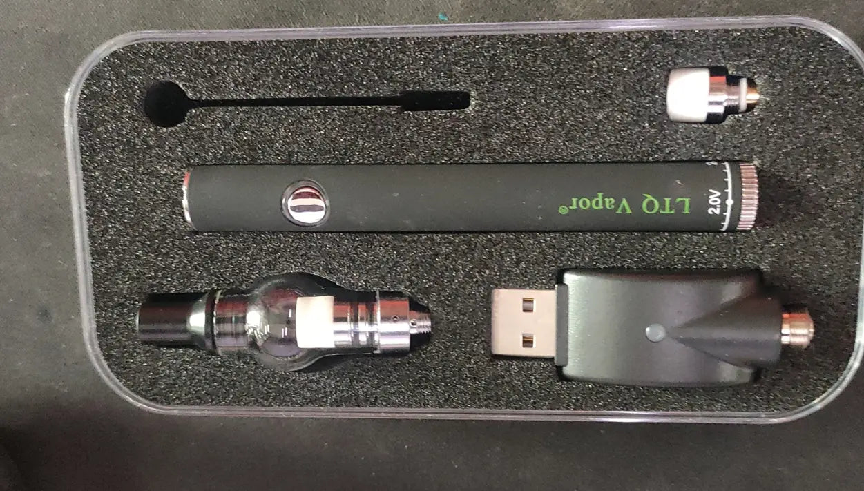 Black ltq vapor electronic cigarette kit with metallic accents and usb charger designed for mobile phone repair short circuit detection tool use.