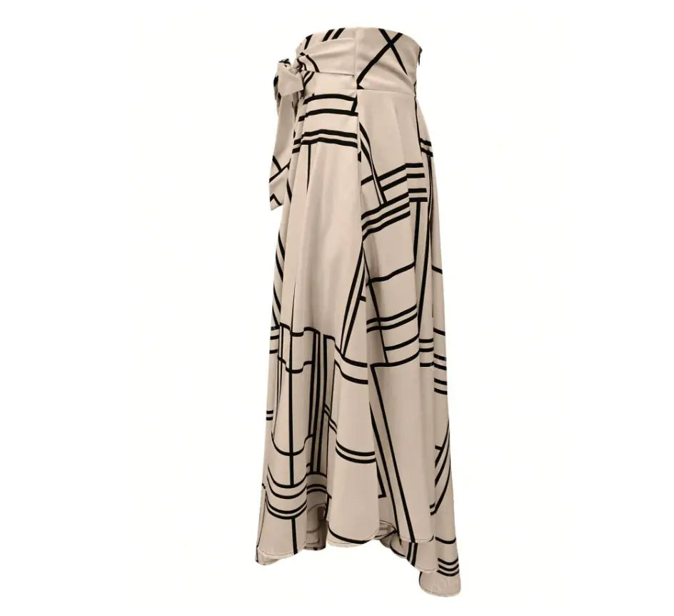 Beige wrap skirt with black geometric lines and a tied waistband featuring a simple daily slit design ideal for a solid color simple high waist midi skirt.