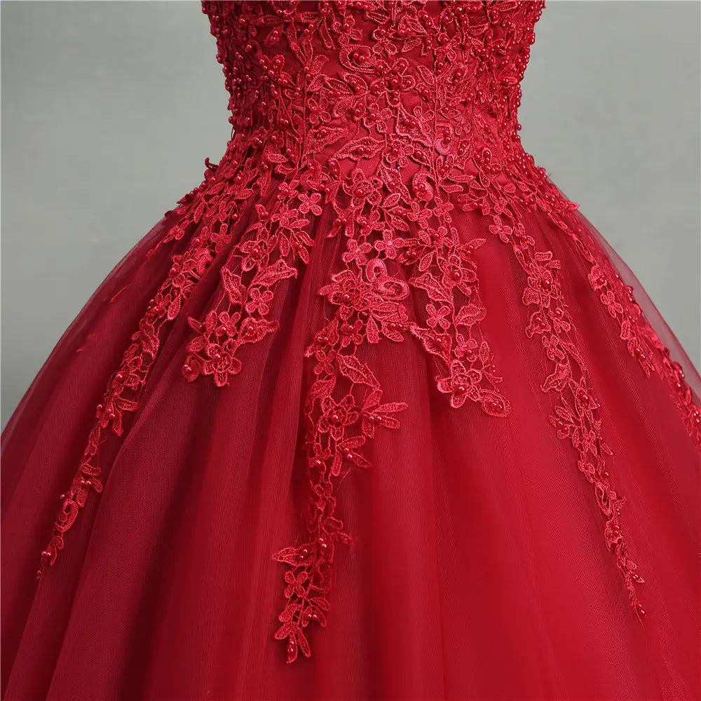 a vibrant red lace bride princess dream ball gown featuring intricate floral lace appliqués and delicate beading on a tulle fabric perfect for spring tutu tutu occasions.