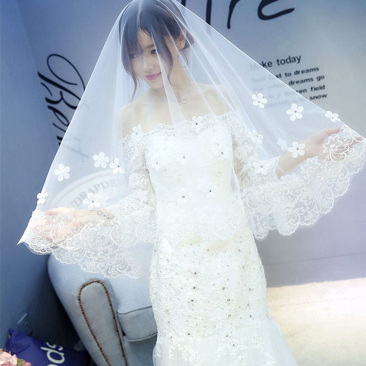 a delicate white korean lace petal bridal veil featuring embroidered floral appliqués and scalloped edges suitable as a style veil korean for weddings