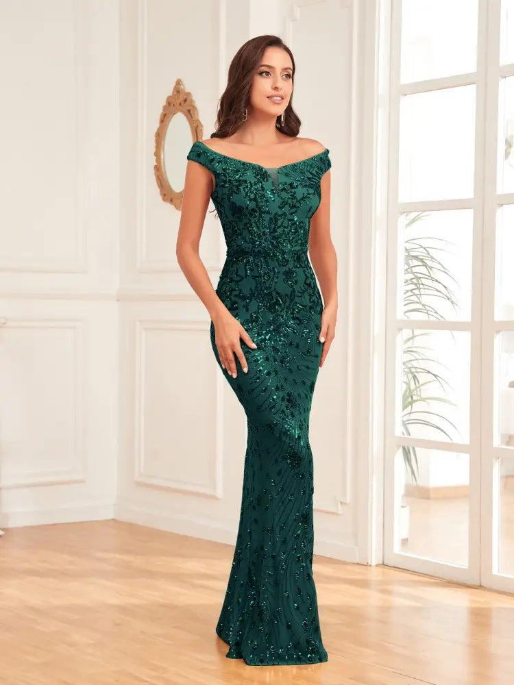 Emerald green sequined sexy high waist mermaid gown featuring an off-the-shoulder neckline and intricate lace detailing.