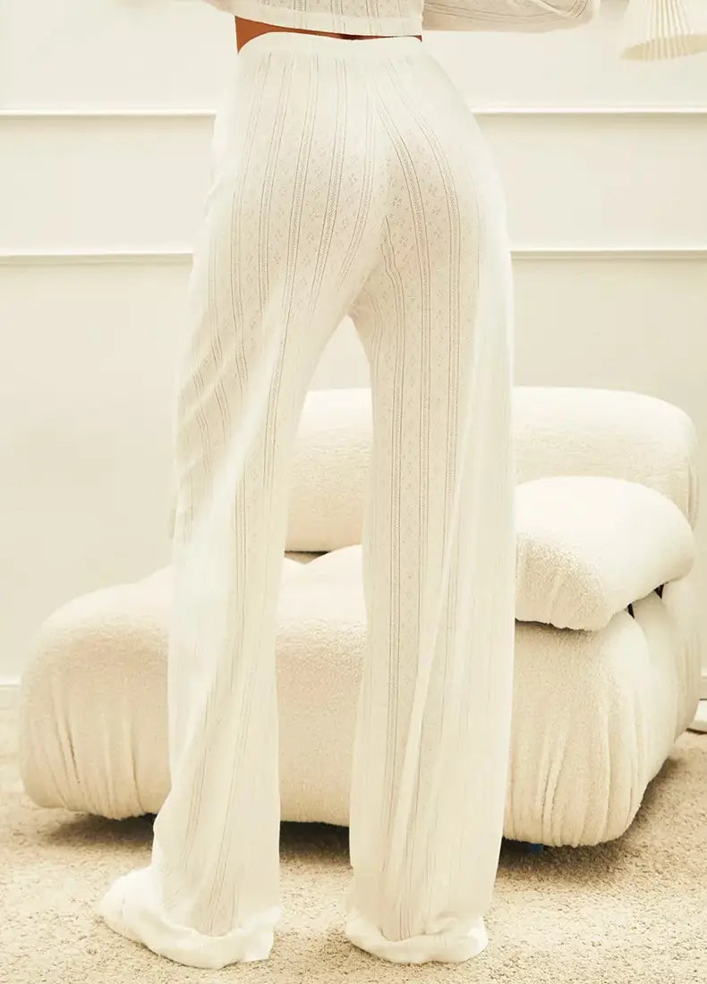 wide-leg white ribbed knit trousers paired with a white ribbed knit fashion cardigan long sleeve in a stylish long sleeve outfit