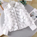 White sheer chiffon gauzy shirt with fluffy cloud-like pom-poms featuring delicate flower chiffon gauzy fabric