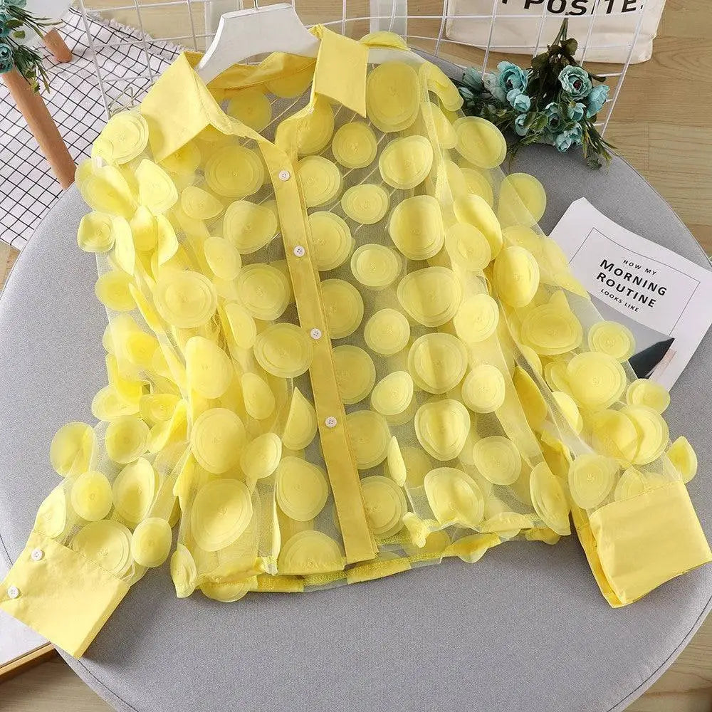 A vibrant yellow 3D flower chiffon gauzy shirt with sheer fabric and立体的圆形亮片装饰, featuring a collared long-sleeve design