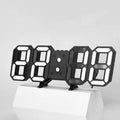 Black 3d remote control led digital wall clock with sleek modern design and illuminated white numerals display