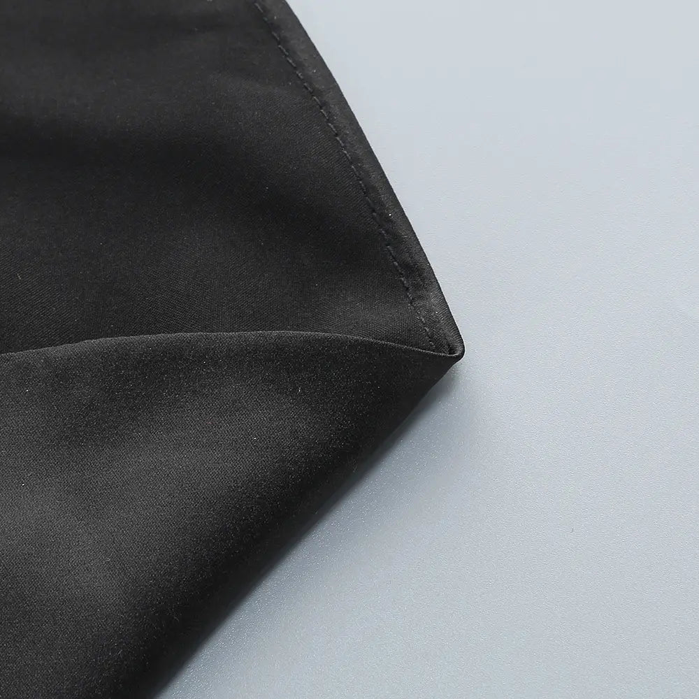 one-shoulder slit mop black dress two-piece set featuring smooth glossy black satin fabric with neatly stitched edges and set sexy lacing detail.