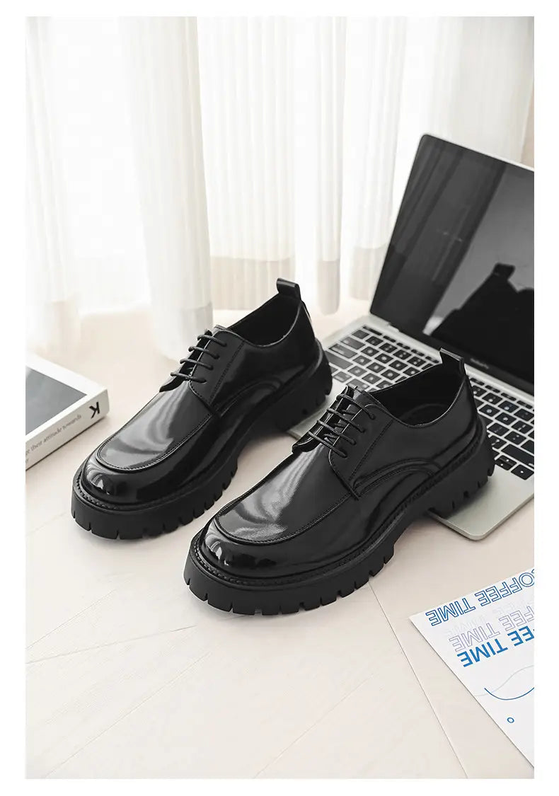 men’s casual leather shoes featuring black patent leather lace-up oxford design with chunky rubber soles and red stitching accents.