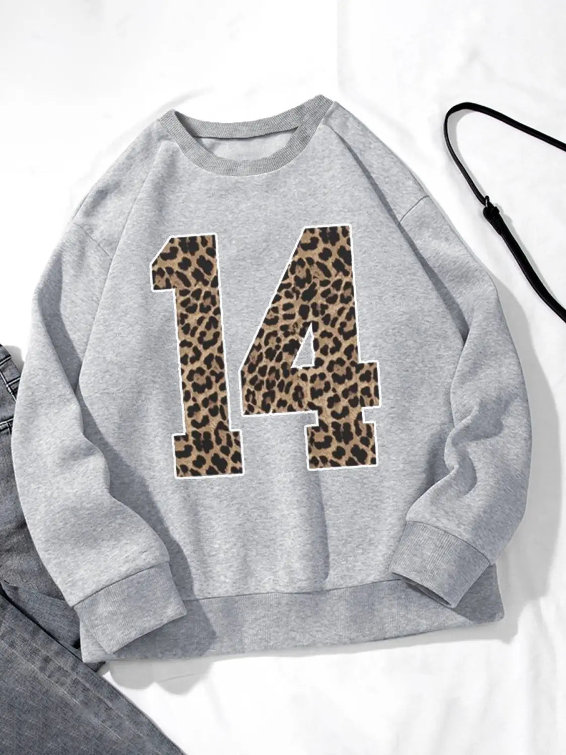 gray crew neck sweatshirt featuring a bold black leopard-print number 14 on the front.