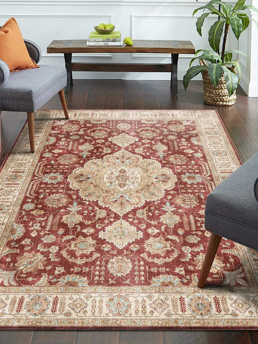a burgundy ornate short pile area rug featuring richly patterned red and beige intricate floral and geometric designs with a vintage aesthetic suitable for luxury women’s fashion settings including plus size dresses bikinis photoshoots.