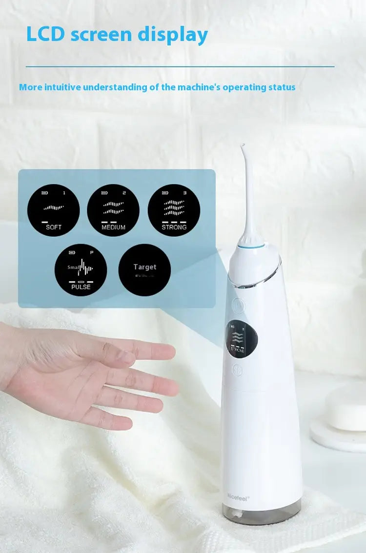 White electric water toothpick with a sleek modern design and silver accents featuring a digital display for multifunctional water toothpick use.