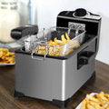 Silver and black 3l electric french fries fryer with mesh basket filled with golden french fries for home use