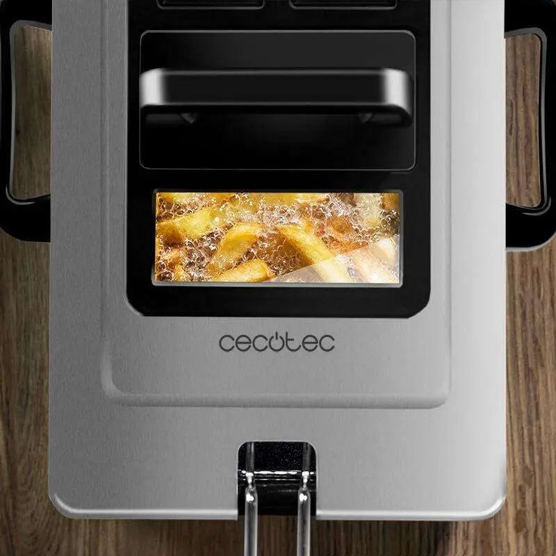 Silver Cecotec black 3L electric french fries fryer with transparent window showing golden french fries sizzling in oil