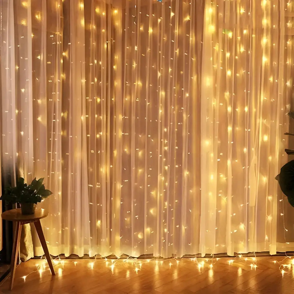 3m x 3m usb metallic christmas curtain lights with 300 warm golden led bulbs on sheer white fabric backdrop