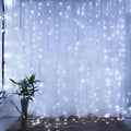 White led usb metallic christmas curtain lights 3m x 3m with 300 bright white bulbs glowing softly