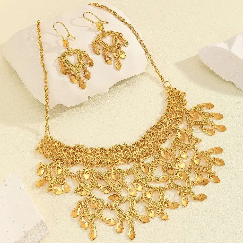 Golden heart-themed choker necklace with intricate filigree detailing and dangling charms in 3pcs fashionable retro luxury hollow necklace earrings set