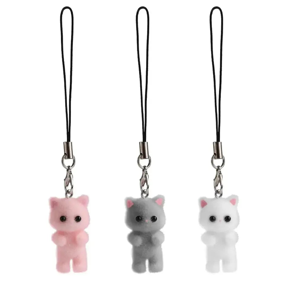 Three plush cat phone charms in pink gray and white as a 3pcs fluffy cat y2k kitten keychain set
