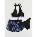 Black halter 3pcs leaf print bikini set with blue tropical leaves and matching high-waisted shorts for summer fashion