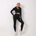 Black long-sleeved zip-up crop top with high-waisted leggings in a 3pcs yoga set seamless sport ribbed athleisure design