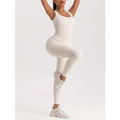 Cream-colored pack ribbed solid casual wear bodysuits with waist curve design paired with chunky white sneakers