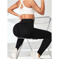 Black high-waisted leggings with tummy control butt lifting design for womens yoga and activewear
