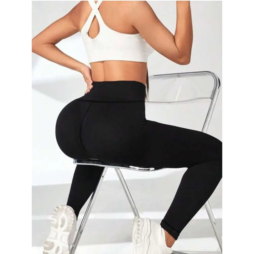Black high-waisted leggings with tummy control butt lifting design for womens yoga and activewear