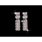 A pair of sparkling multi-tiered silver-toned geometric cascading rhinestones matching earrings from necklace set