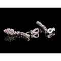 A pair of silver-toned matching earrings with clear faceted crystals in a geometric cascading rhinestones design