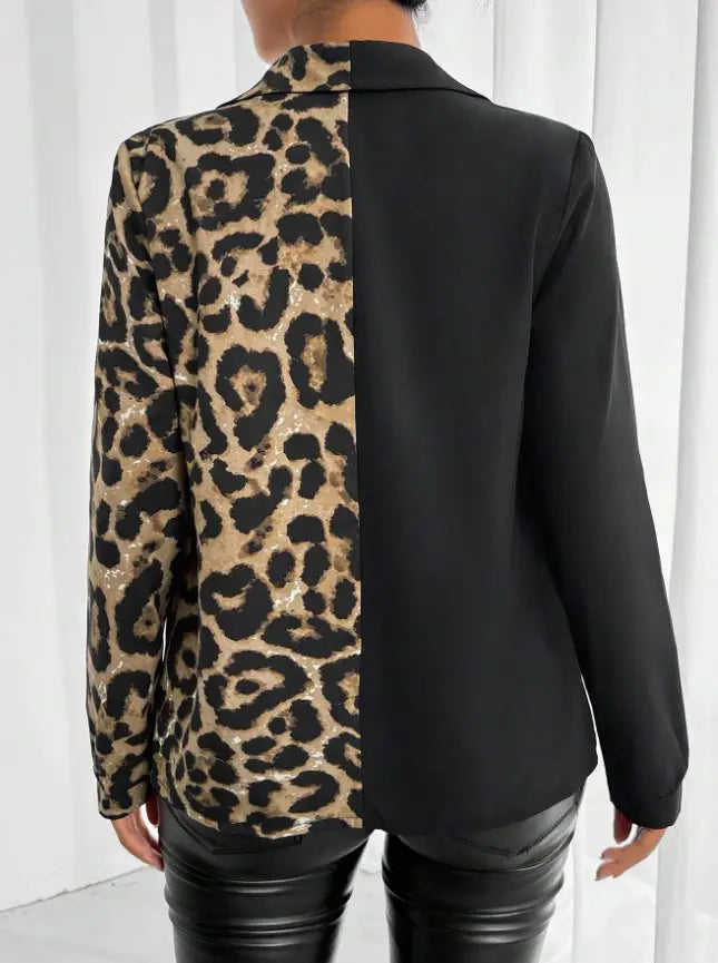 a stylish printed belted shirt featuring a bold leopard print with shimmering sequins on one side and solid black fabric on the other