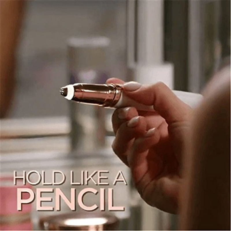 a rose gold and white flawlessly brows electric eyebrow remover held like a pencil designed for precise eyebrow trimming