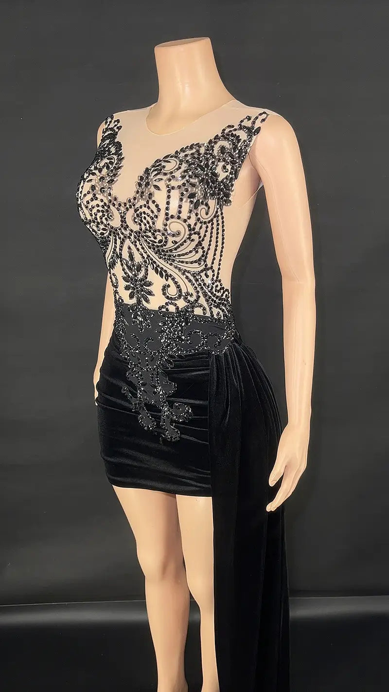 Black velvet luxury evening dress featuring a black beaded lace bodice with velvet skirt and side slit for a summer luxury evening or evening dress female occasion.