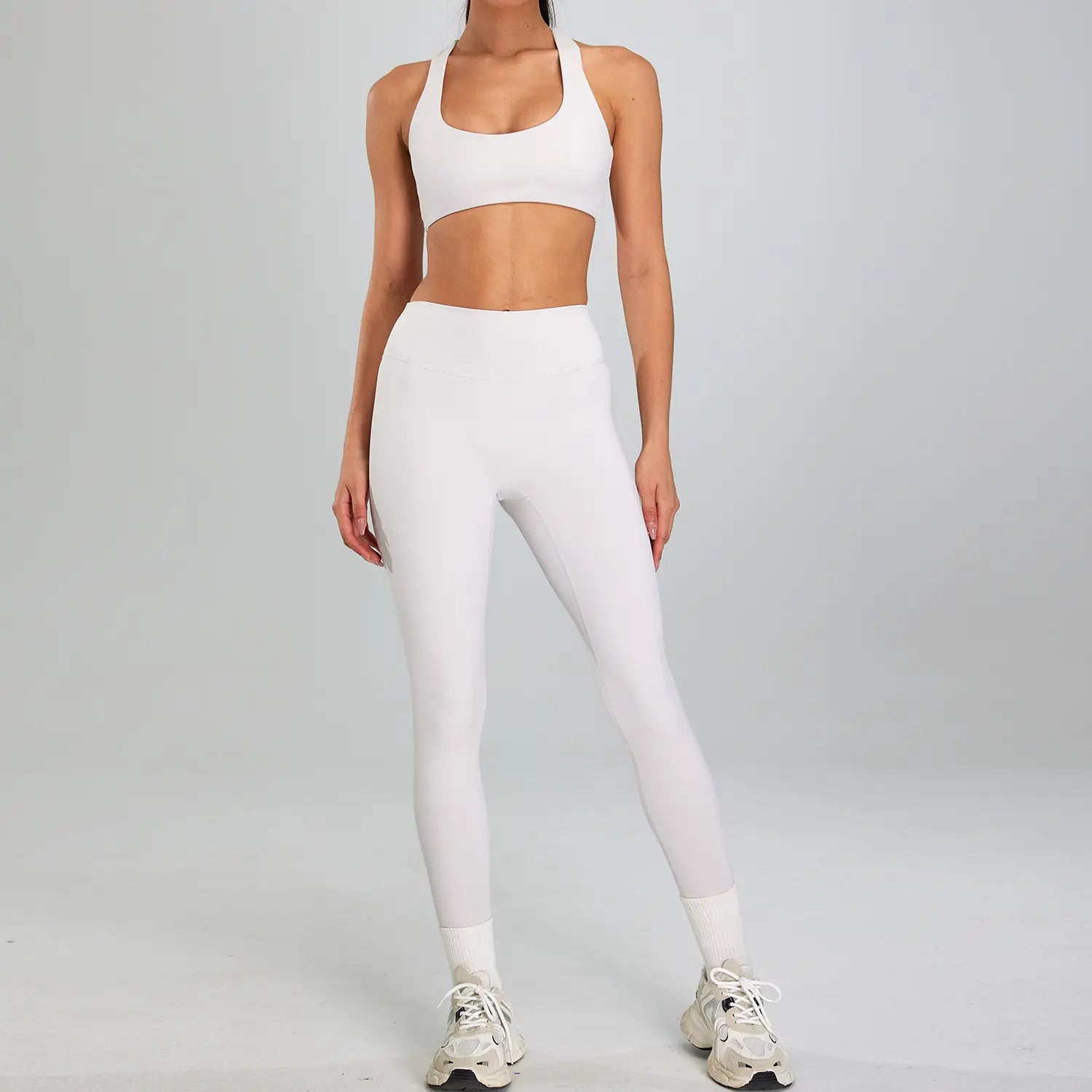 white seamless high-waisted leggings with a smooth form-fitting design featured in the maroon high waist suit outdoor running nude set ideal for sports suit outdoor activities and suit outdoor running.