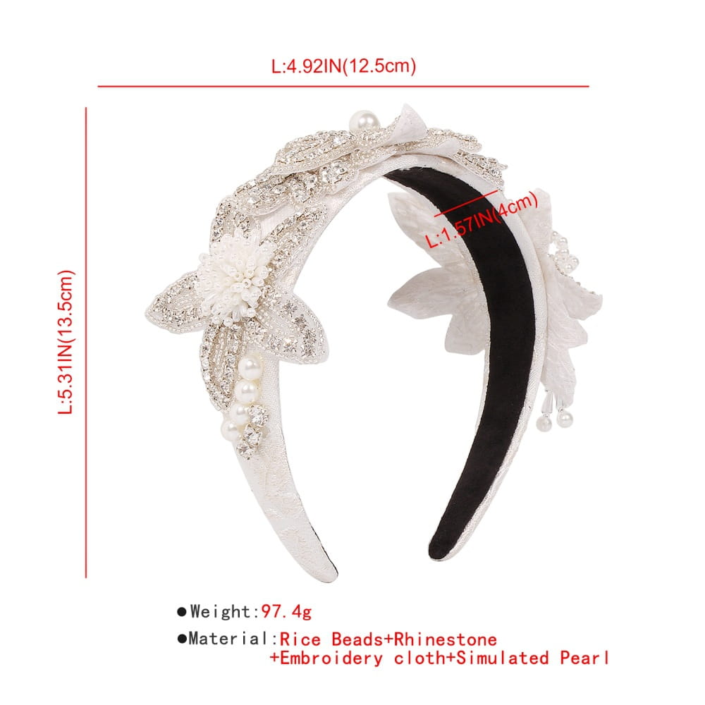 Elegant white vintage crystal floral temperament hair accessories headband adorned with sparkling rhinestones rice beads and simulated pearls on embroidered cloth.