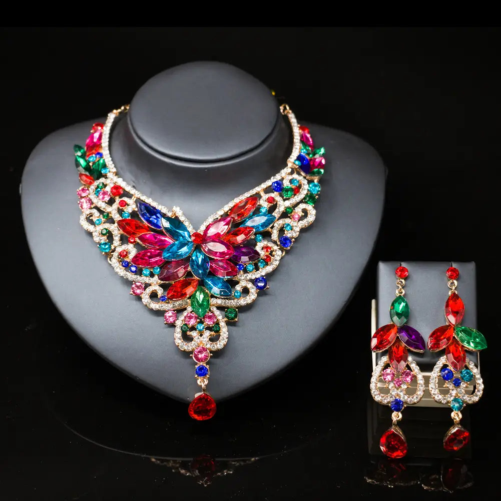 Vibrant multicolored butterfly-themed choker necklace with intricate gold-tone metalwork and dangling red gemstone drop from the american color exaggerated bride jewelry set designed for a speed selling explosion.