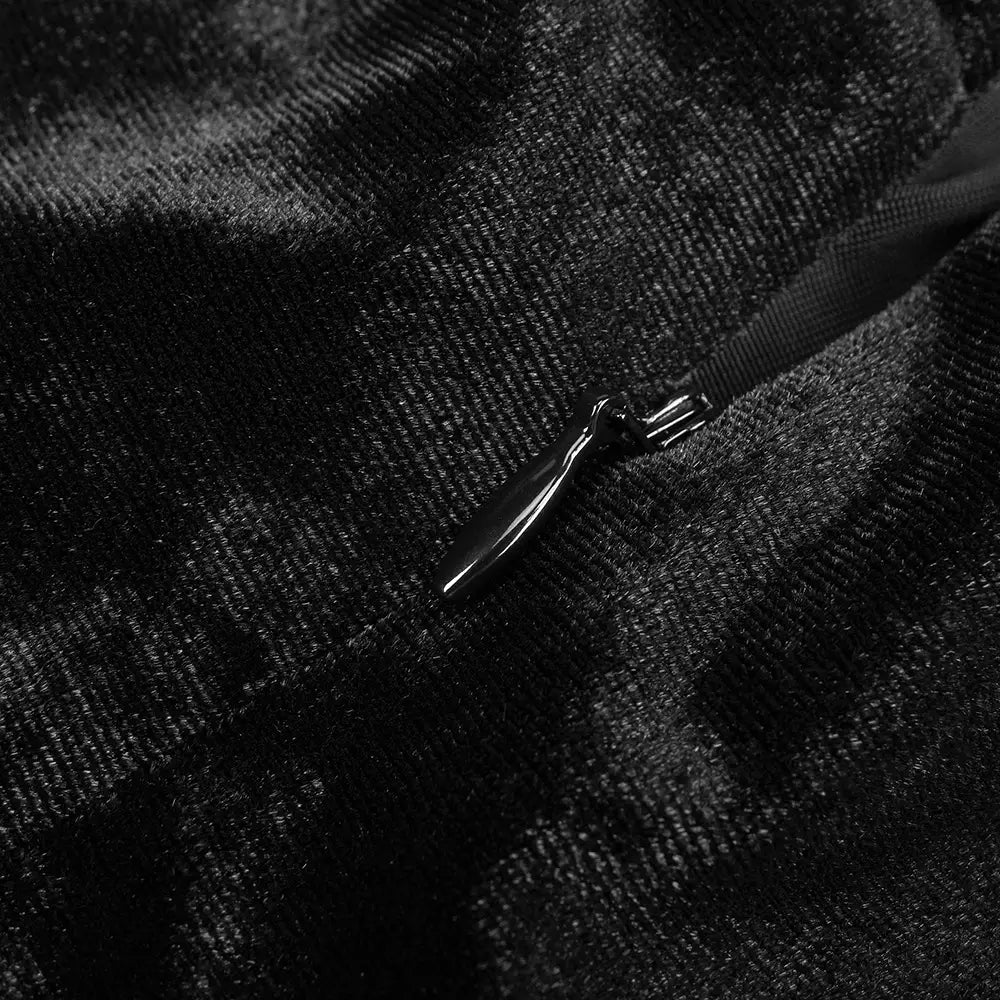 black camisole backless slim fit velvet floral gown featuring a black zipper pull with a sleek metallic finish on dark textured fabric at the back side