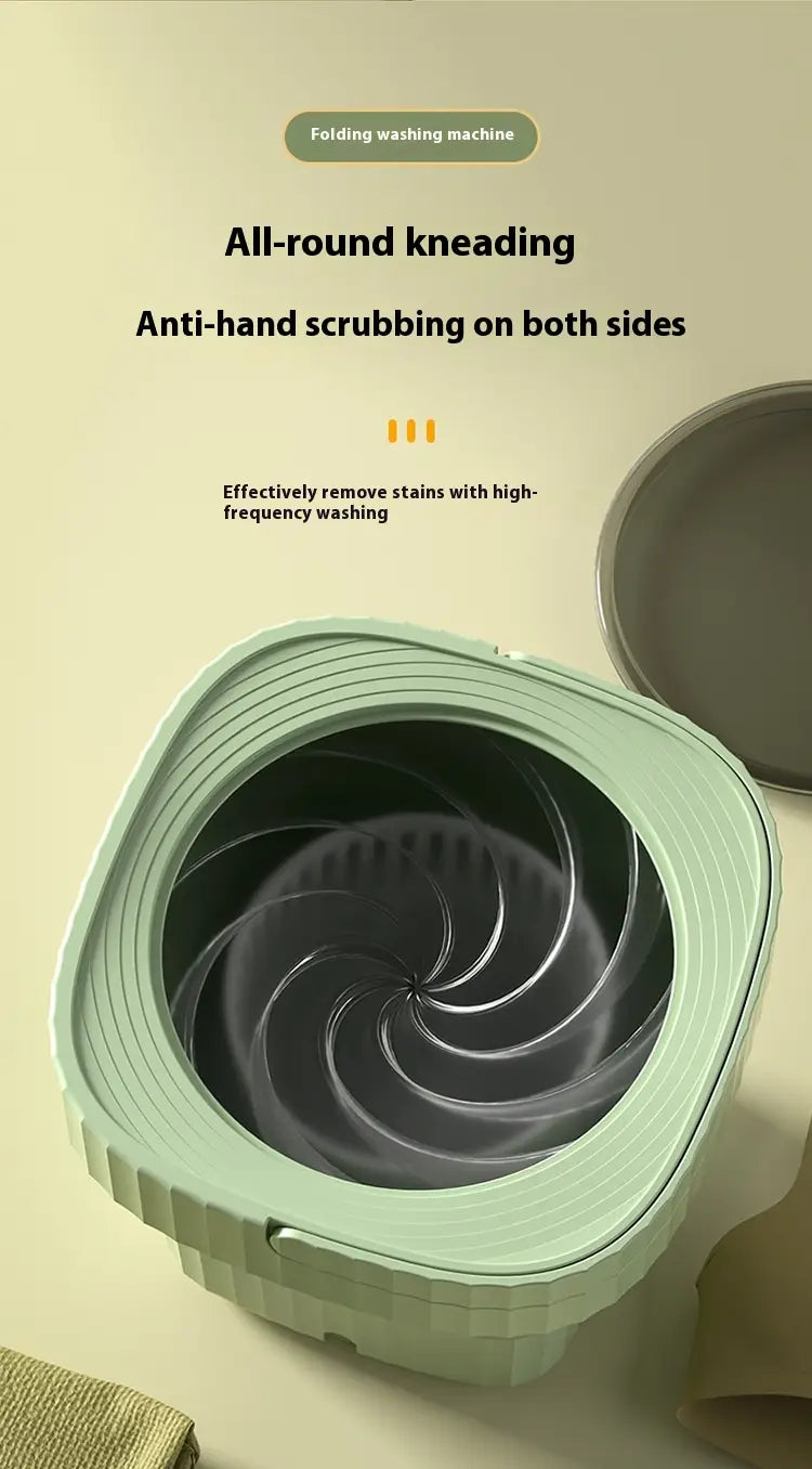 Mint green folding washing machine with a compact, ribbed exterior and spiral interior for efficient folding washing.
