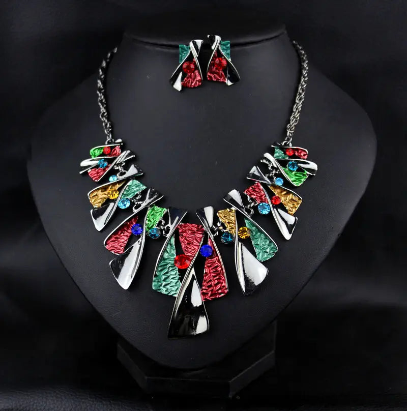 metal geometric shape necklace with vibrant colorful enamel accents in red green blue and yellow, silver-toned chains, and rhinestone embellishments from geometric shape rhinestone earring necklace set