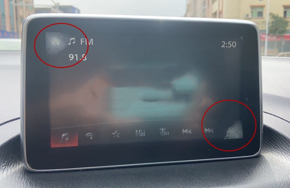 original car exterior touch screen black car exterior screen displaying fm radio station 91.8 and playback controls.