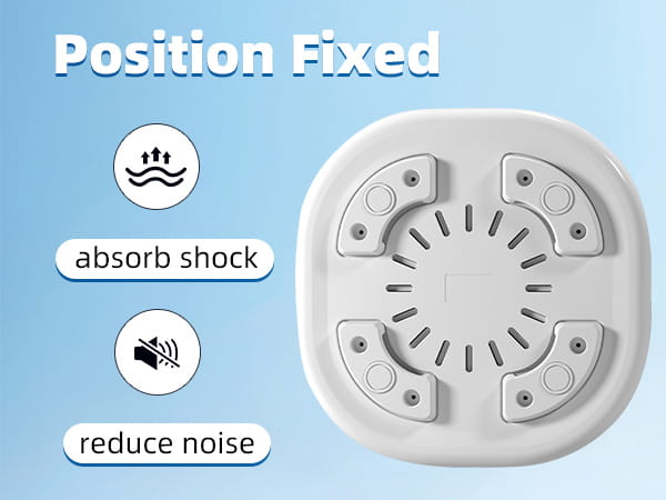 White circular shock absorber with four symmetrical mounting points and central vented design for portable white mini underwear washing machine.