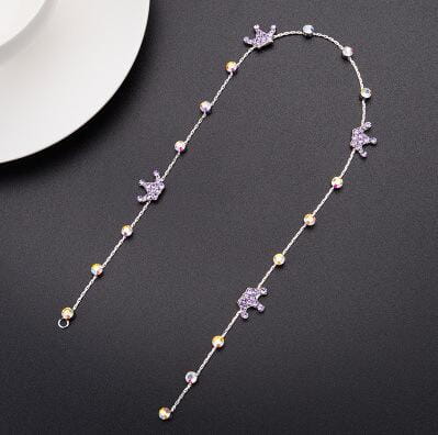 A delicate silver chain necklace with sparkling crystal stars and alternating gold-toned beads designed as elegant wedding hair accessories for bridal hair styling.
