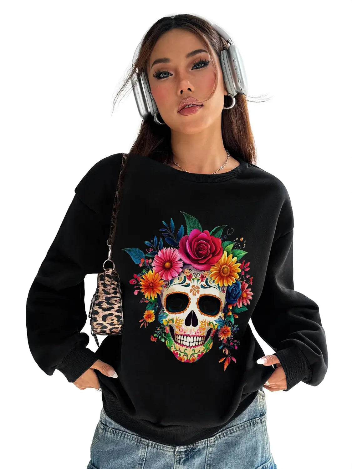 Black crew neck sweatshirt with basic long sleeve design featuring a vibrant colorful floral sugar skull for daily wear.