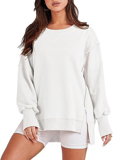 white solid oversized sweatshirt with crew neck featuring a relaxed fit and side slits for comfortable casual wear