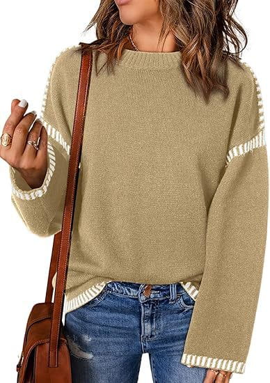 olive green solid round neck pullover knit sweater with white pom-pom trim along the sleeves and hem