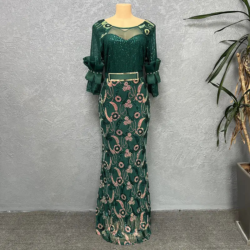 Emerald green half sleeve slim fit evening dress featuring round neck shirt design with sequined fabric floral embroidery and ruffled sleeves.