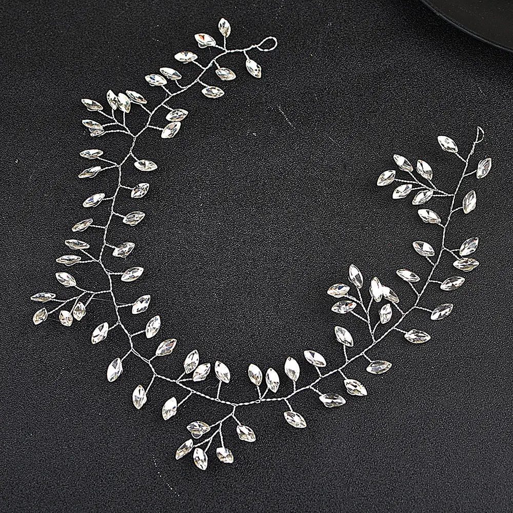 silver leafy vine hair accessory with clear faceted crystals featuring horse eye silver flexible chain for wedding use